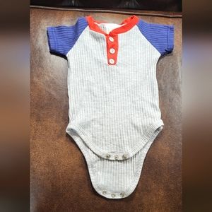 Gray Bodysuit with Blue Sleeves and Red Collar